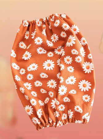 Matørehette brent orange m/blomster S