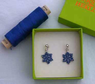 Glitrende snøfnugg blå