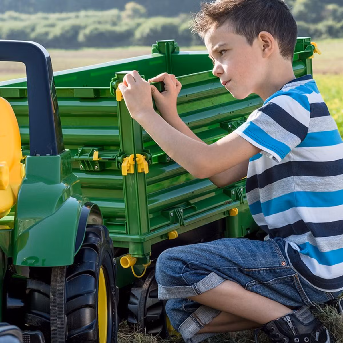 Rolig och lärorik lek med RollyMulti John Deere Bild8