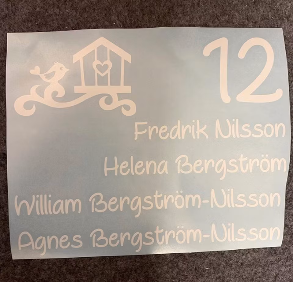 Brevlådedekal - fågel i bo