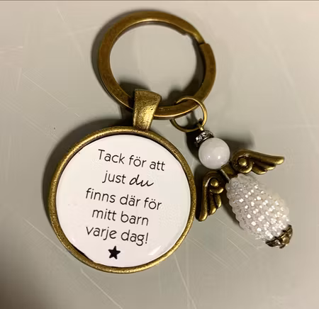 Nyckelring i brons med ängel