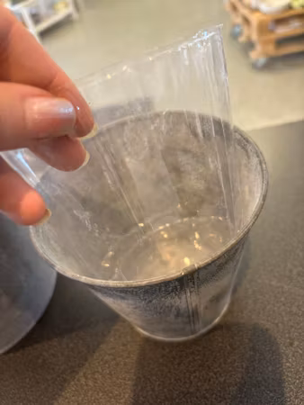 Plåtkruka med plast