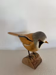 Träsnidad fågel skäggmes