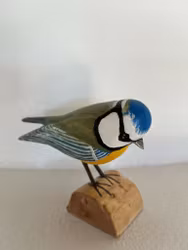 Träsnidad fågel