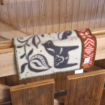 Sittunderlag i ull (mönster Dalarna)
