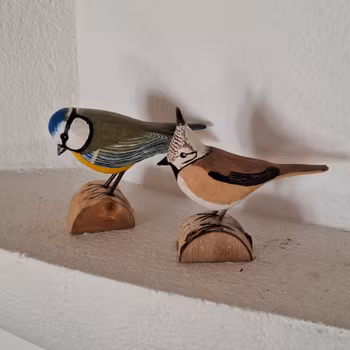 Träsnidade fåglar
