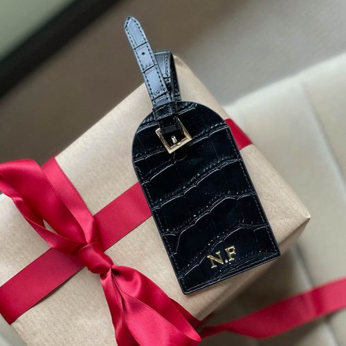 Svart Croc travel tag