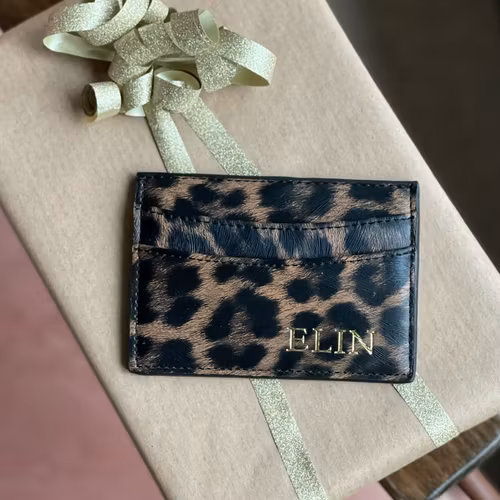 Leopard korthållare