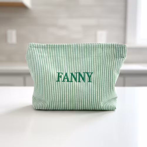 Grön necessär med namn