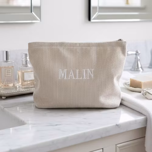 Beige necessär med namn