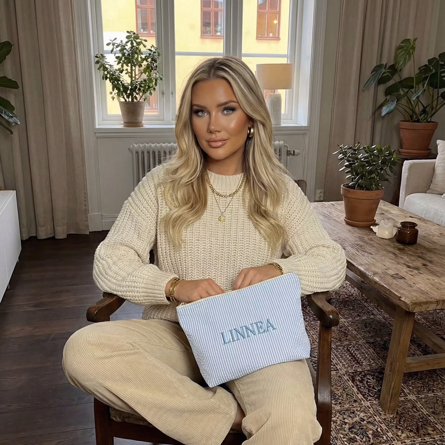 Ljusblå necessär med namn