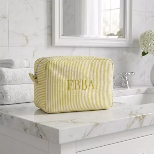 Gul sminkväska med namn