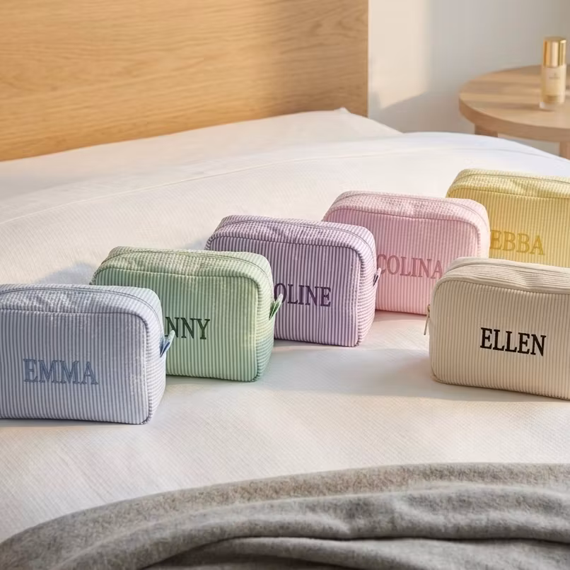 Ljusblå sminkväska med namn