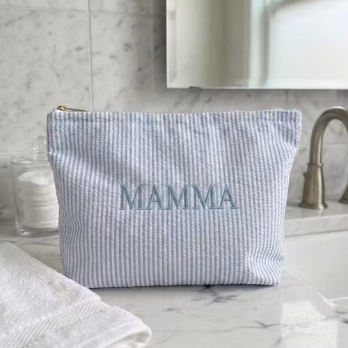 Ljusblå necessär med namn
