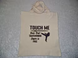 Handlenett taekwon-do jente