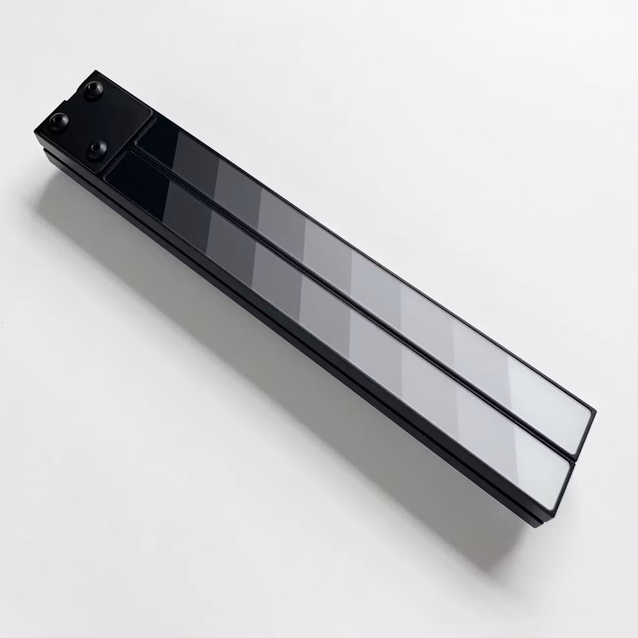 Filmsticks Gripsticks Laminate Resin Sticks, i gråskala