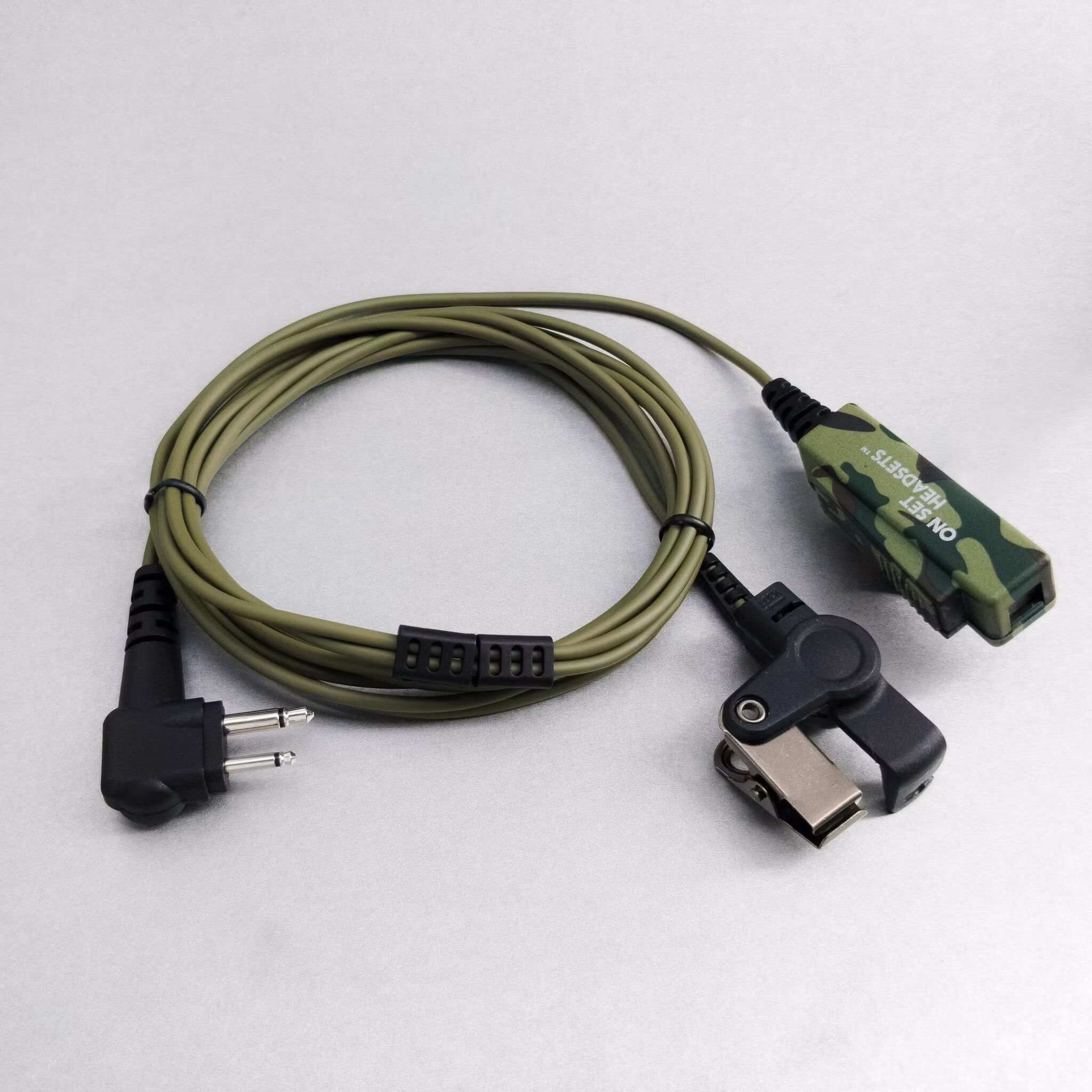 On Set Headsets Green Camo for Motorola, Kevlar reinforced cable assembly, H2O resistant mic, Medical grade (hypoallergenic) silica. The FilmPro is a High Quality Walkie Talkie Headset. Built to take 