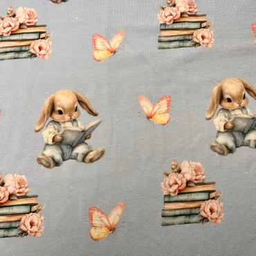 Kaniner med böcker och fjärilar, ljusblå bakgrund Bomullsjersey