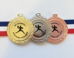 Medalj 40 mm med idrottsmotiv, band & text