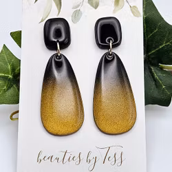 Rundade rektanglar i svartguld-ombré