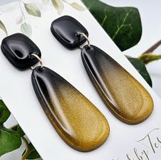 Rundade rektanglar i svartguld-ombré