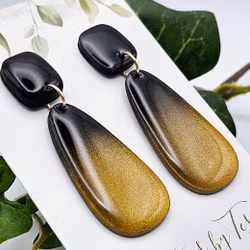 Rundade rektanglar i svartguld-ombré