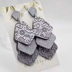 Silverfärgad pentagon i två varianter