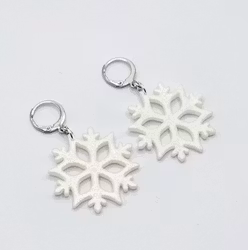 Vita skimrande snöstjärnor