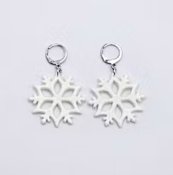 Vita skimrande snöstjärnor