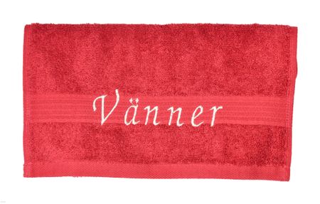 Röd handduk med broderad text "Vänner"