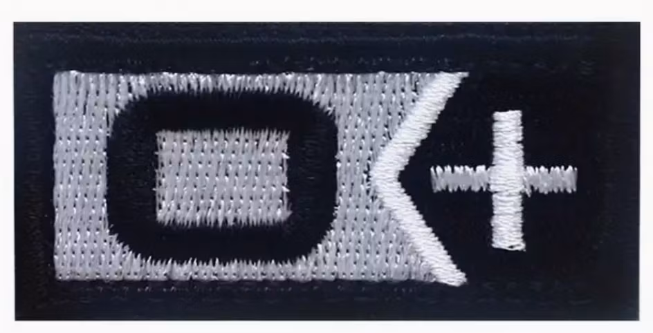 0 + Pos - Svart- Silver  - Patch