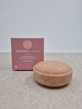 Rose sjampo, rosepulver og duft av roser