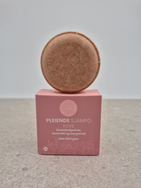 Rose sjampo, rosepulver og duft av roser