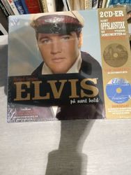 Elvis , ligger i orginal innpakking