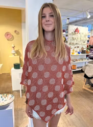 Skuggstickad poncho