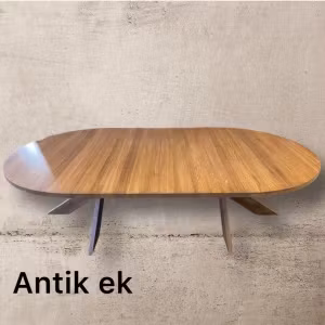 Runt matbord i ek med 1-3 illäggsskivor. Kulör Antik ek