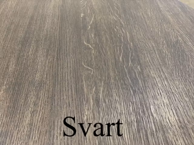 Runt matbord i ek med 1-3 illäggsskivor. Kulör Svart