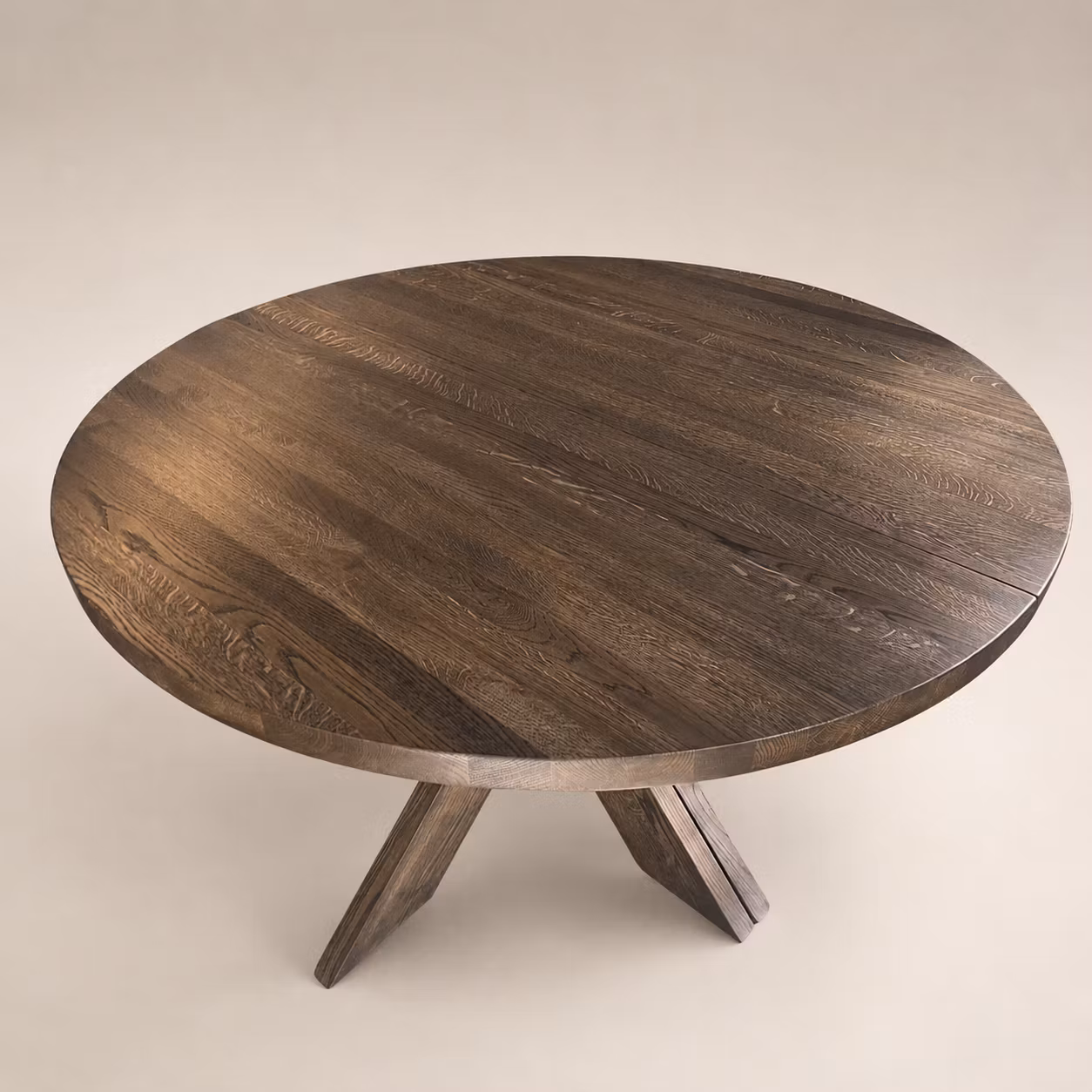 Kulör Dark oak. Runt matbord i ek med 1-3 illäggsskivor.