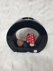 Keramik ljusstake ett värmeljus