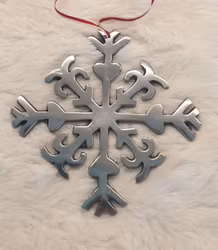 Snöfling i metall