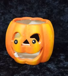 Pumpa i keramik till värmeljus