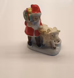 Tomte med bock och ljushållare