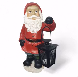 Mellanstor tomte med lyckta i handen