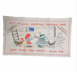 Julbonad med texten "SITT FYLLDA GRÖTFAT STOMTEN FÅR SOM TACK FÖR VAKT I ALLA ÅR"