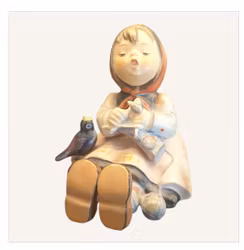 HUMEL sittande flicka som stickar