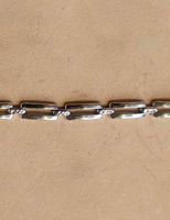 Olika silverarmband