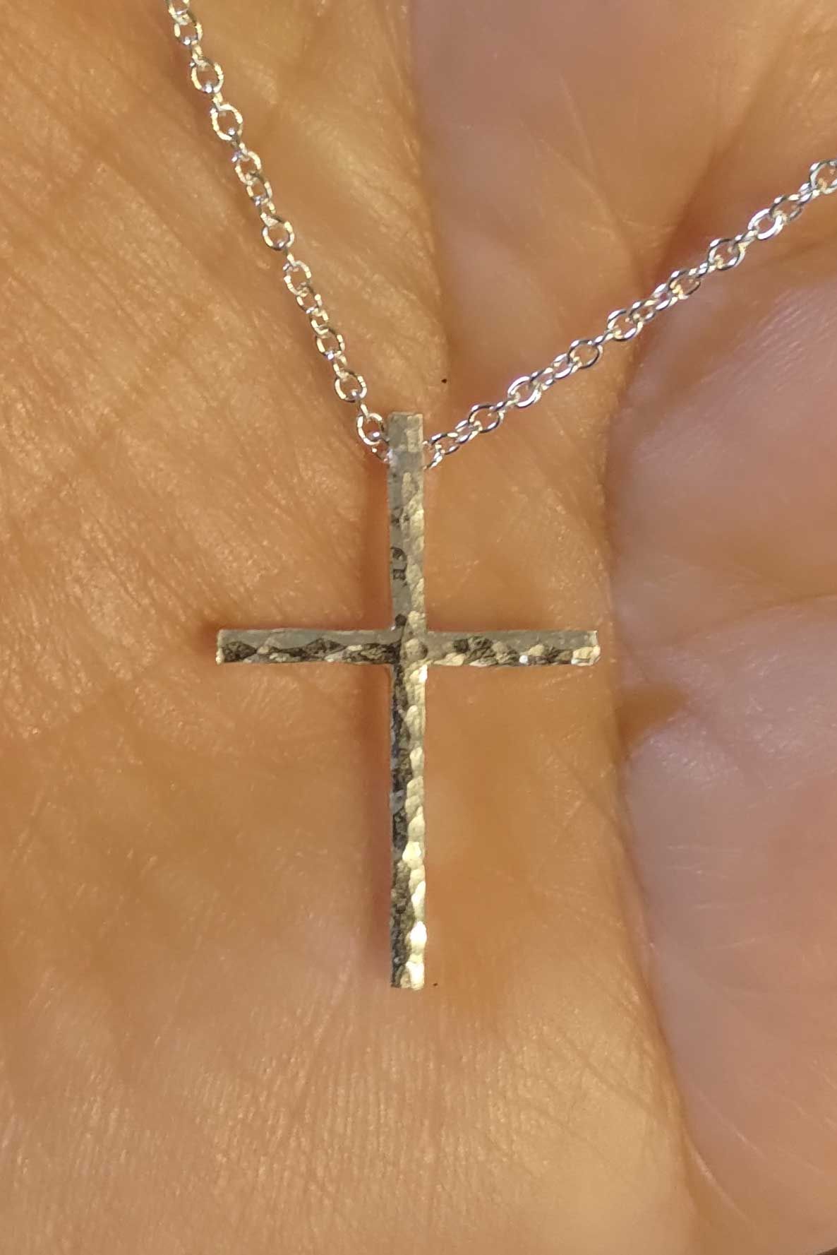 Olika kors i silver