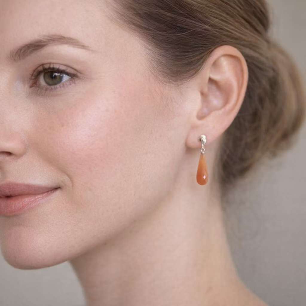 Silverörhängen med hängande rosa månsten