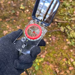 Kompass med spegel och ficklampa