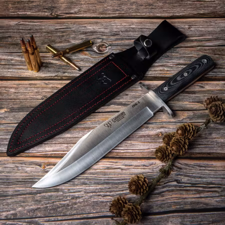 Stor bowie Cudeman JBK-I med svart micarta handtag.